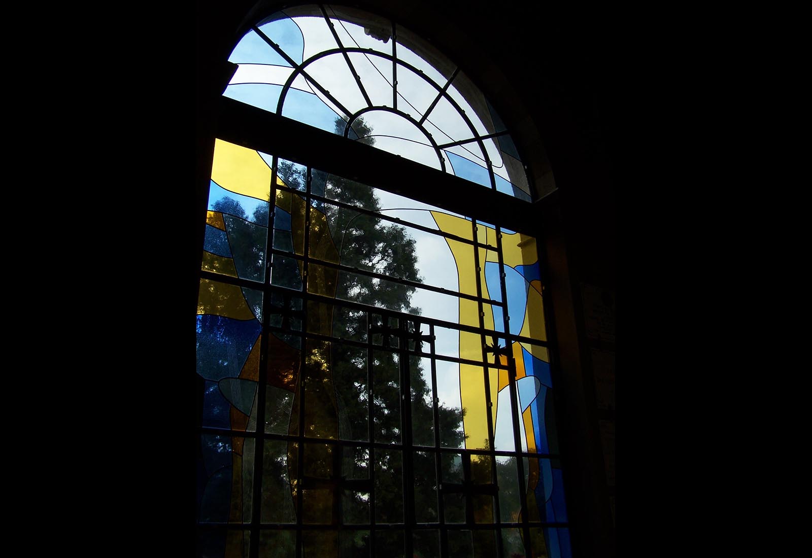 Cemetery priests chapel in Rho - The stained glass window