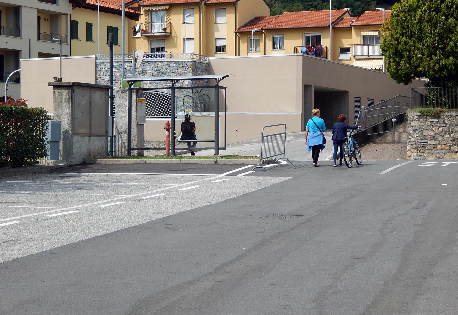 Public underground garage in Gravedona - View from the Guer street