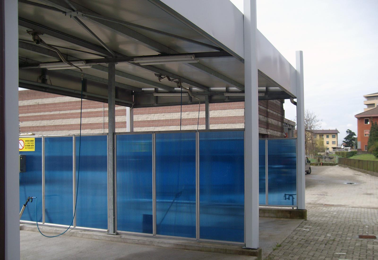 Self-service car washing unit in Novara - View