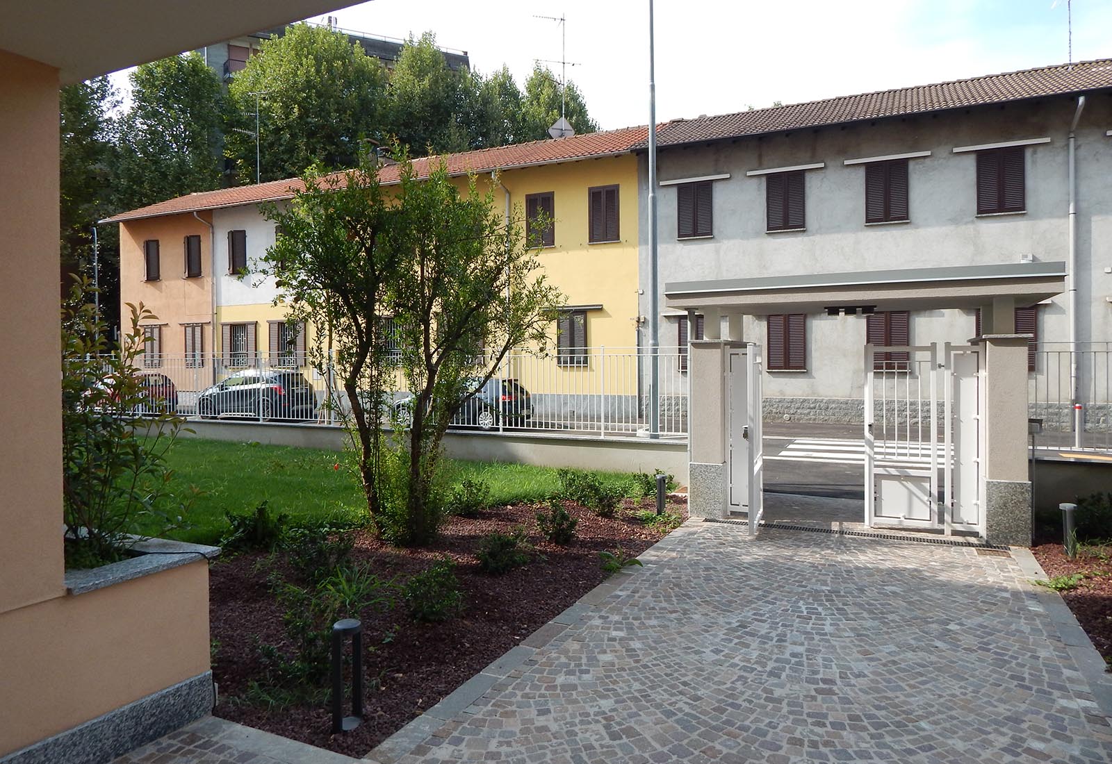 Residential buildings in Biringhello street in Rho - Detail of the building entrance